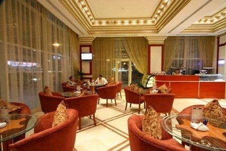 שארג'ה Emirates Palace Hotel Suites מסעדה תמונה